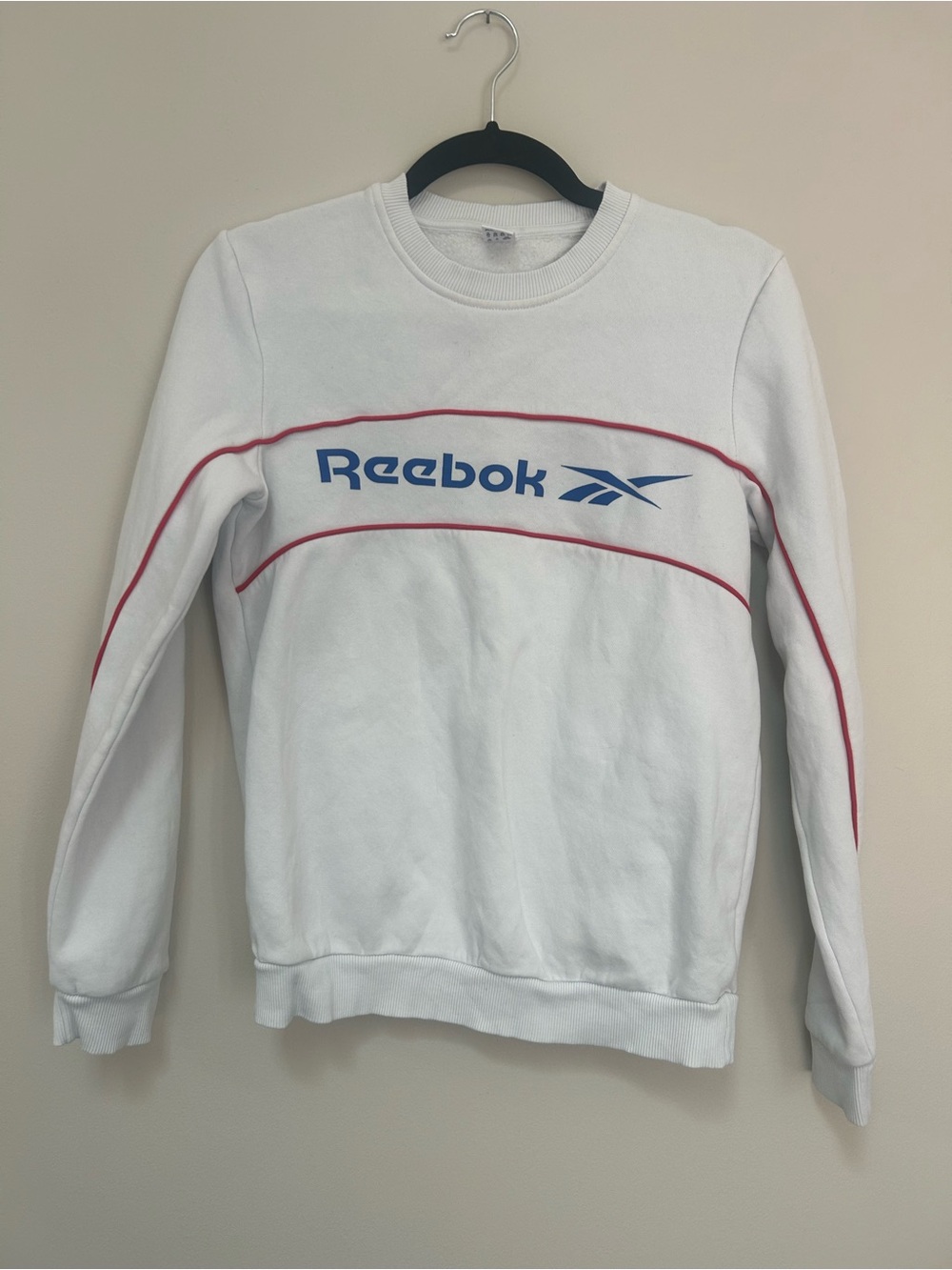 Reebok White Crewneck Sweatshirt with Blue Logo and Red Piping Accents